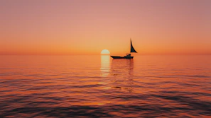 A serene sunset over the ocean with a lone sailboat silhouetted against the colorful sky.