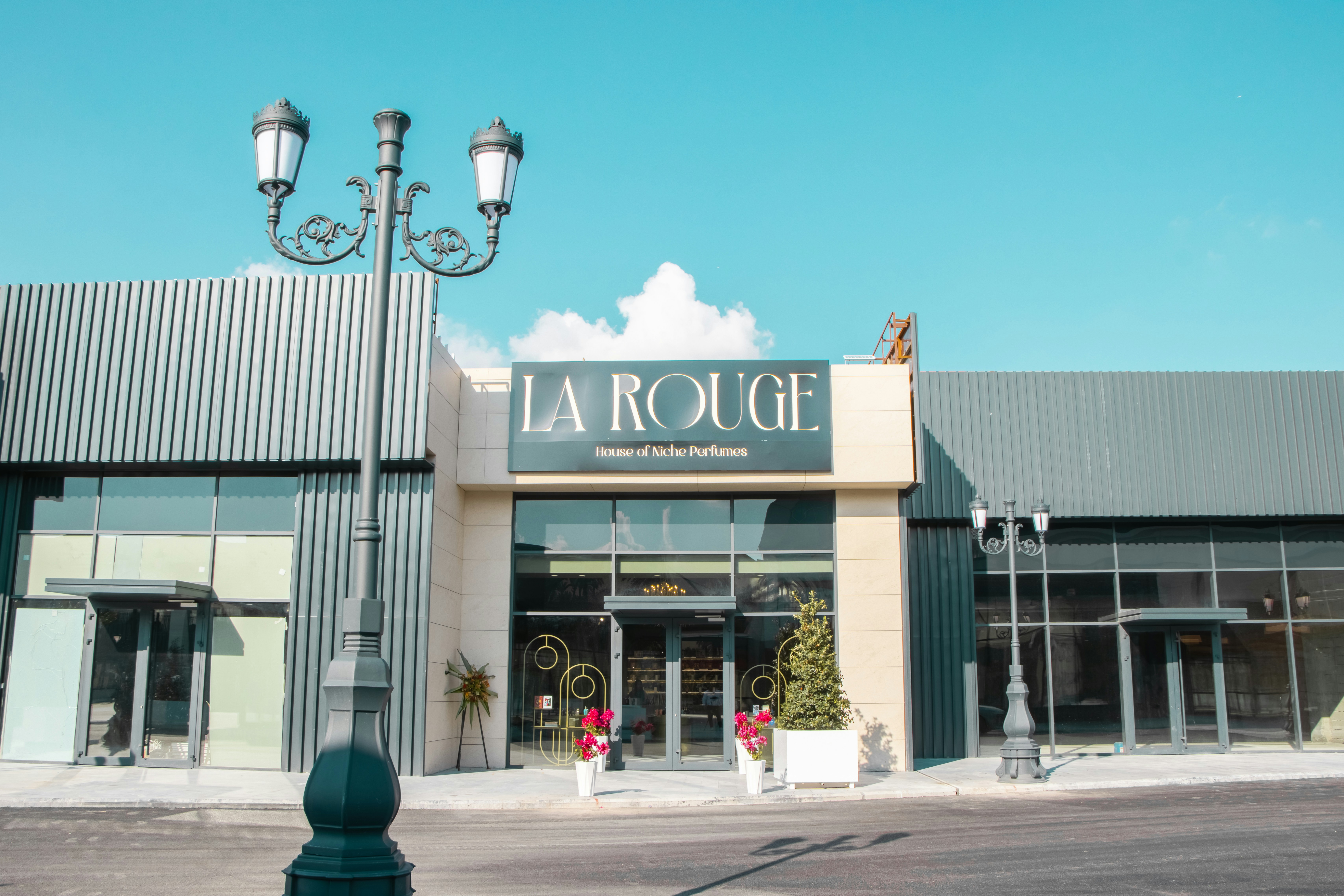 a street light sitting in front of a store