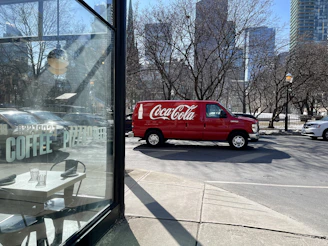 Kitchenfix service van parked outside a busy cafe, ready for chiller repair.
