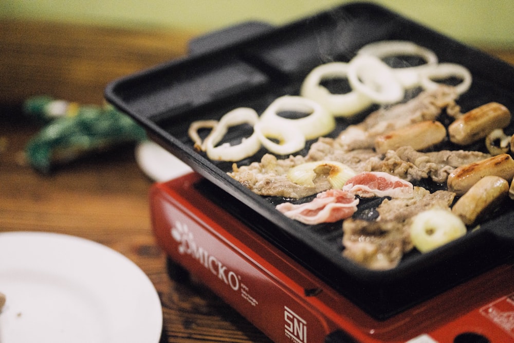 a tray of food sitting on top of a table