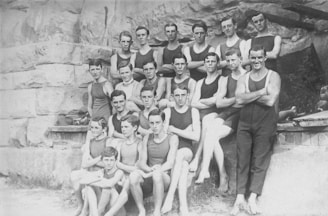 A team photo of the Franklin and Hilliard swim teams posing together.