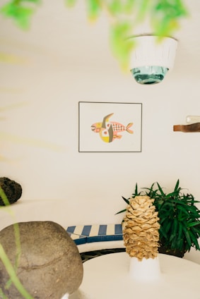 A peaceful room filled with soft aqua tones, comfortable cushions, and art supplies ready for therapy sessions.