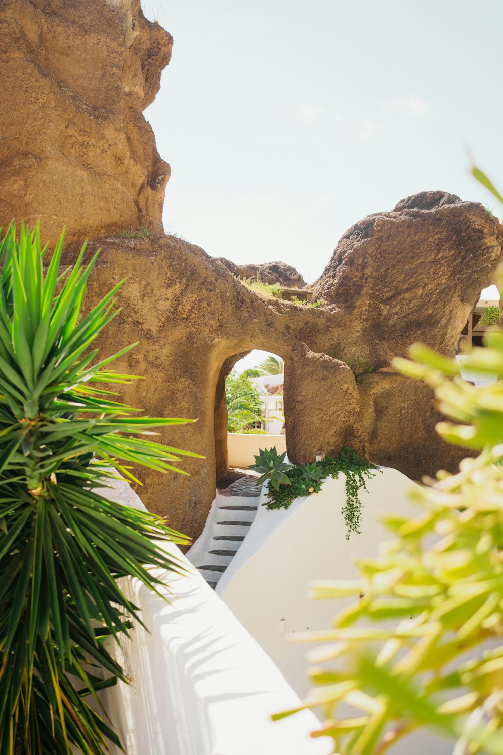 a view of a rock formation through a doorway