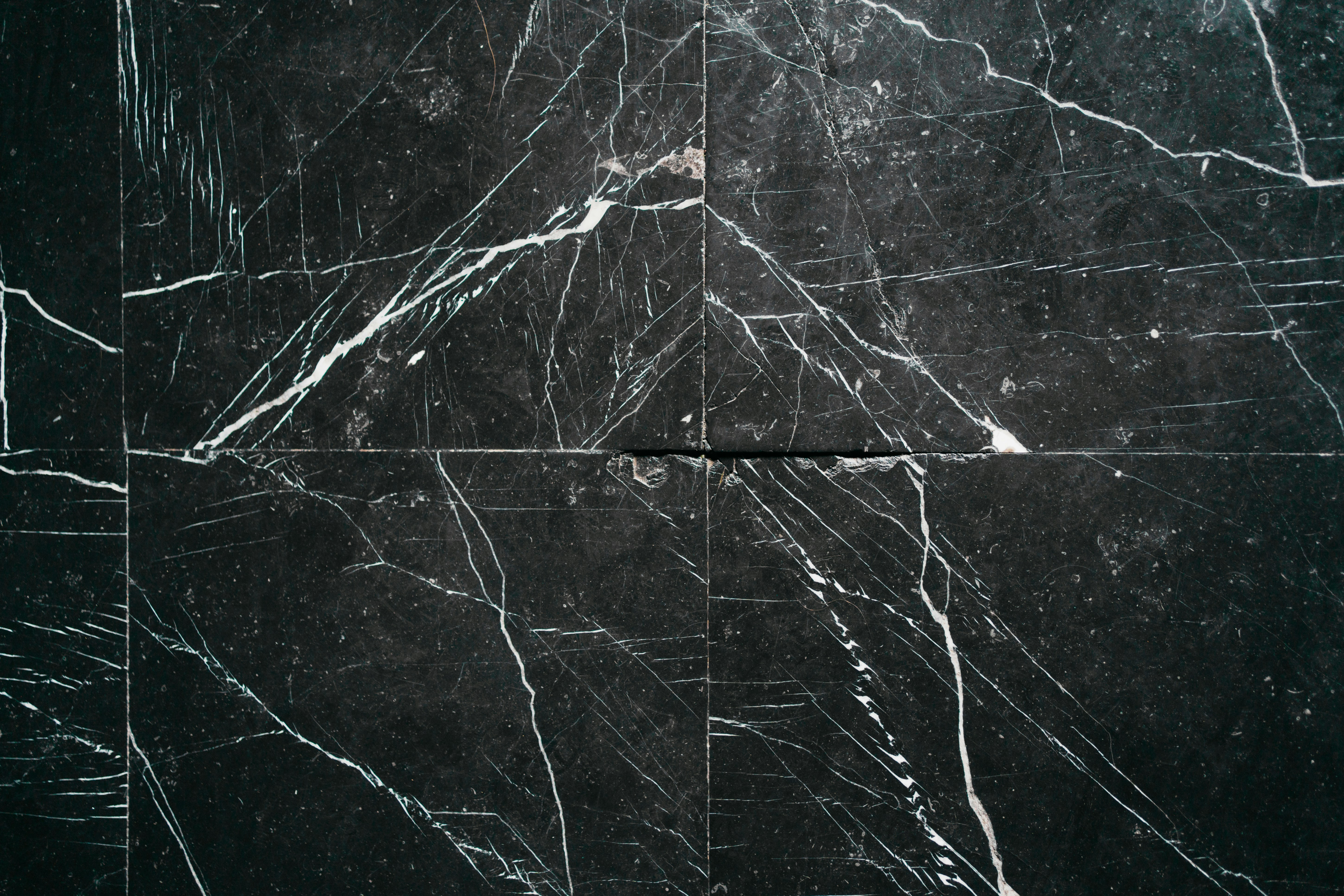 Black marble tile with white lines