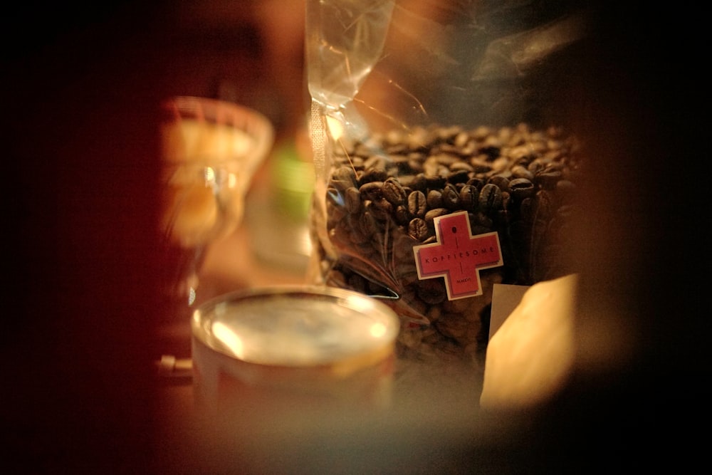 a close up of a red cross on a cake