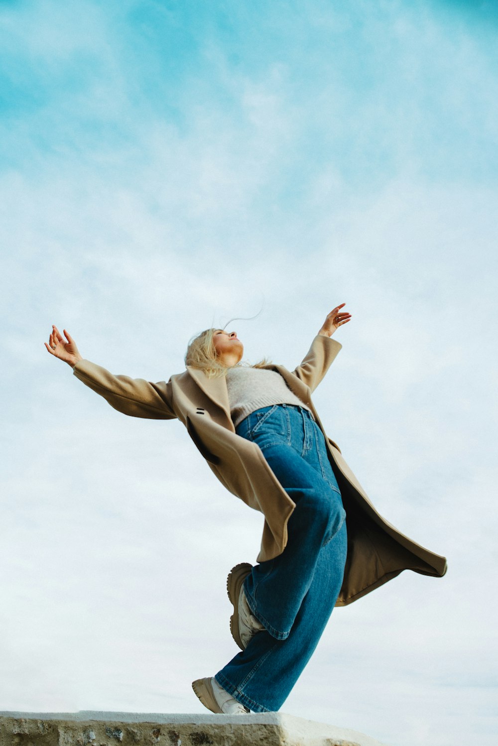 a person jumping in the air on a skateboard