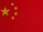 a close up of a red background with yellow stars