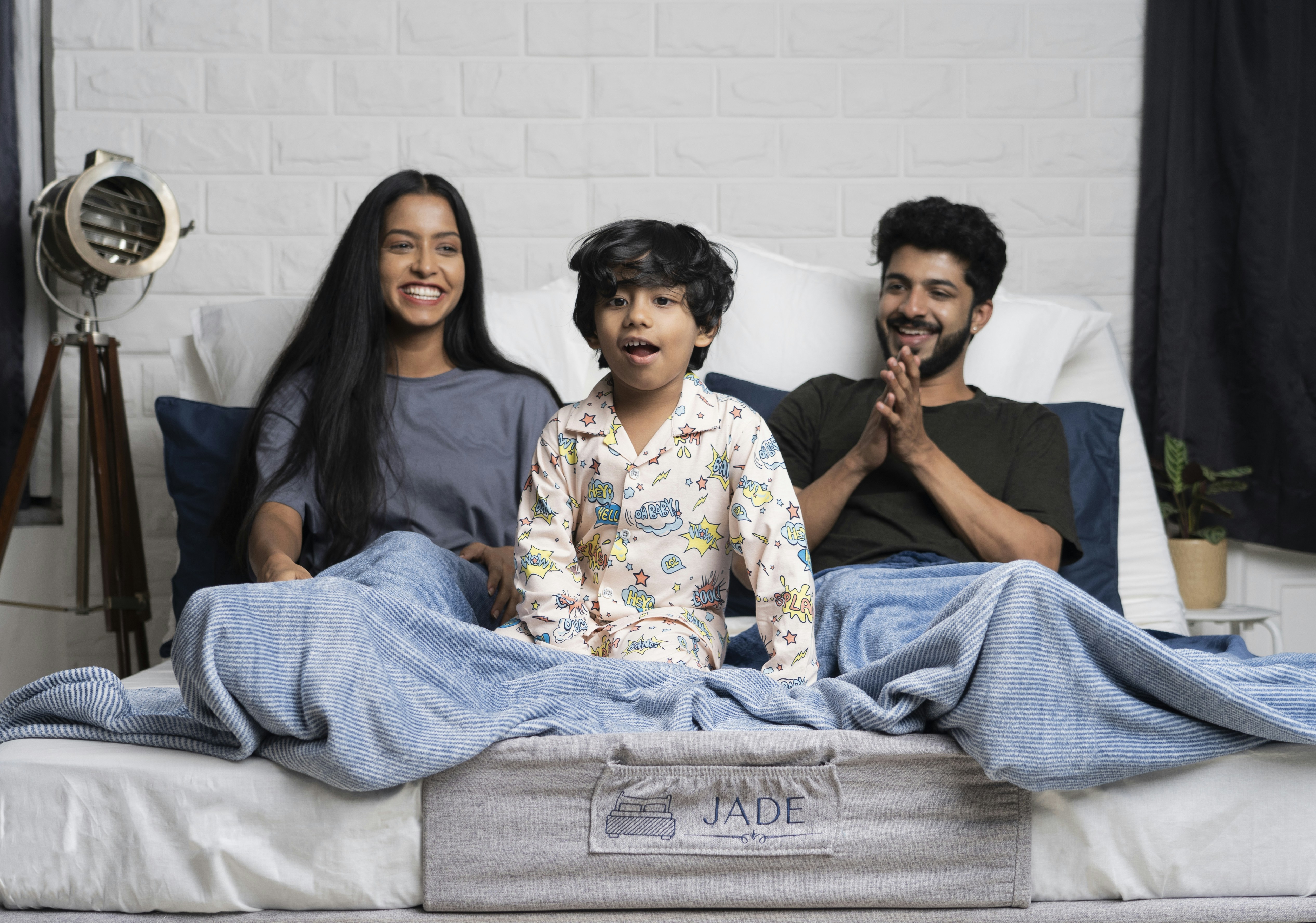 Family on an adjustable bed