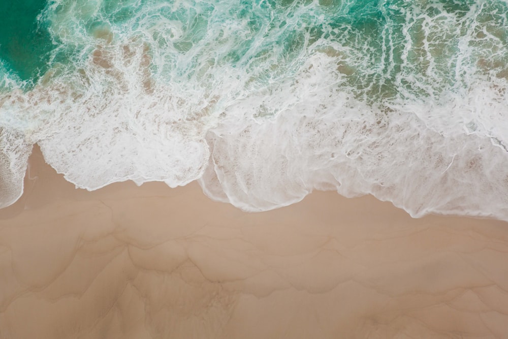 an aerial view of a beach and ocean