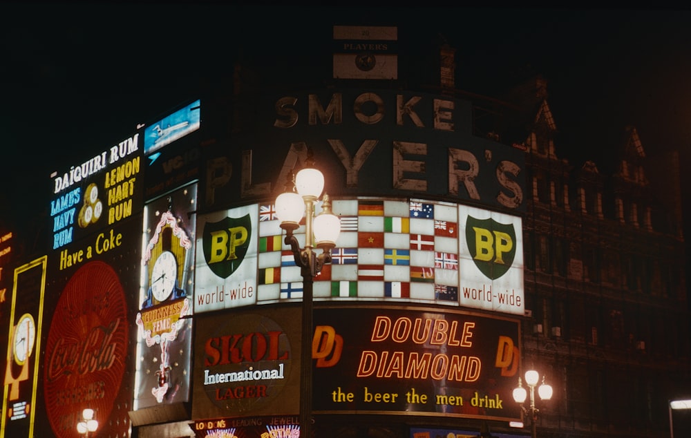 a city street filled with lots of neon signs