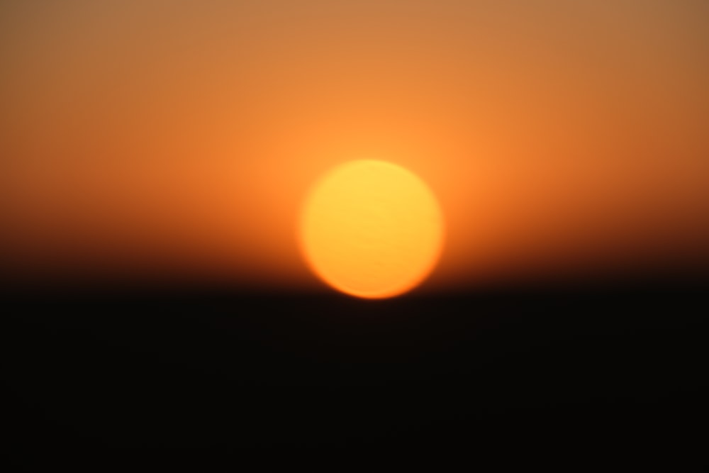 the sun is setting over the horizon of the horizon