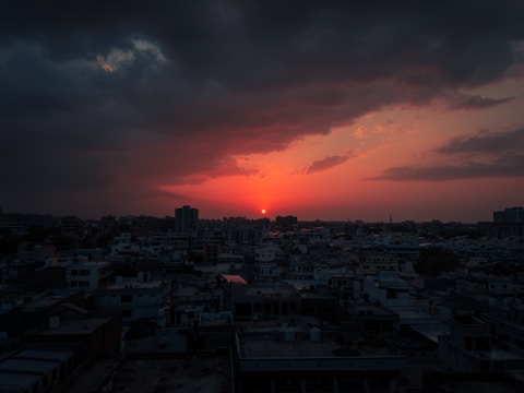 An artistic shot of a cityscape at sunset.