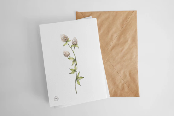 A beautifully designed gift card featuring natural botanical illustrations and soft pastel colors.