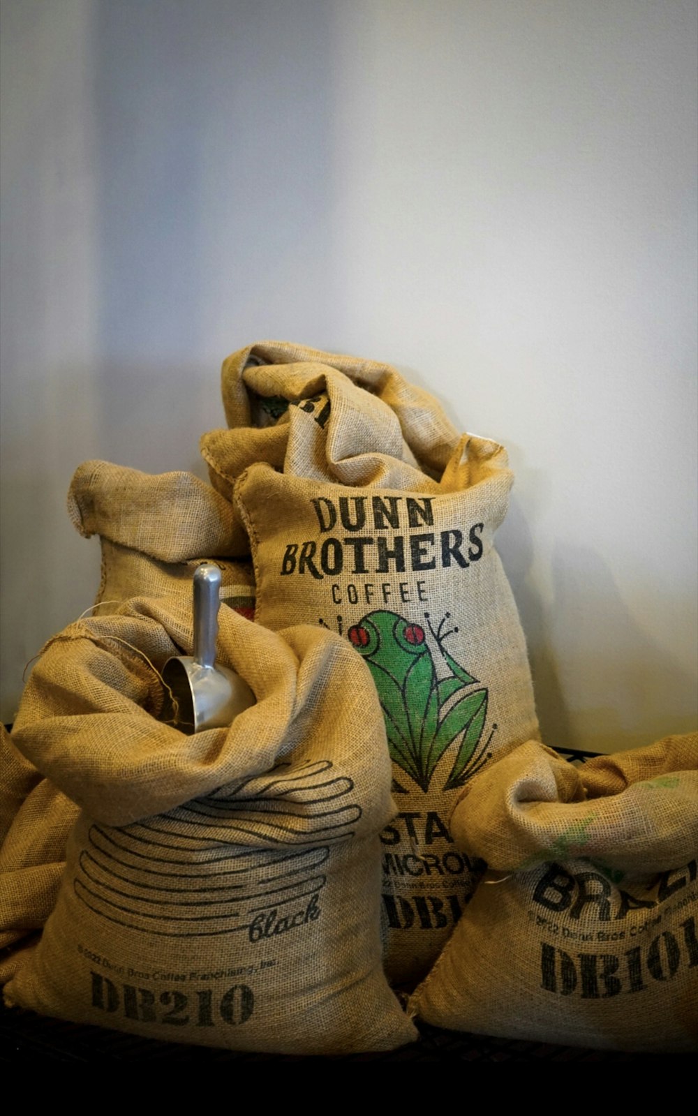 a couple of bags of coffee sitting on top of a table