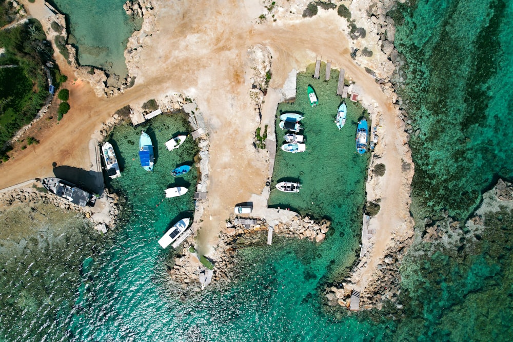 an aerial view of boats docked at a dock