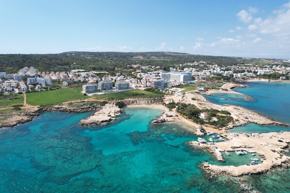 a bird's eye view of a beach and a city