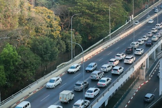 An aerial view of a busy transport route with vehicles.