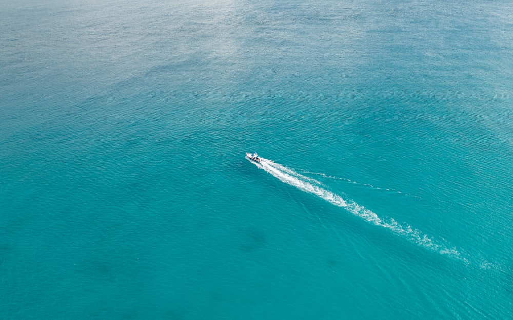 a boat in the middle of a body of water