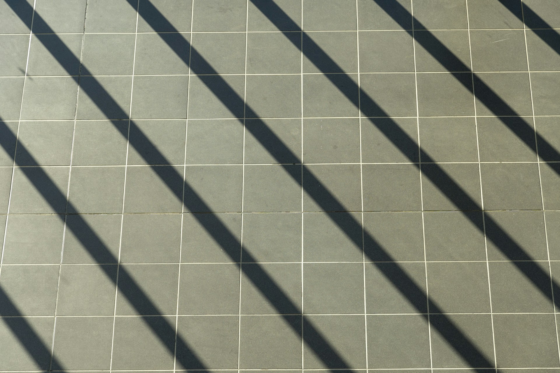 a tiled floor with a clock on it