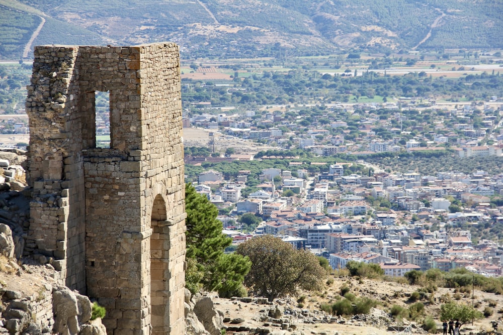 a view of a city from the top of a hill