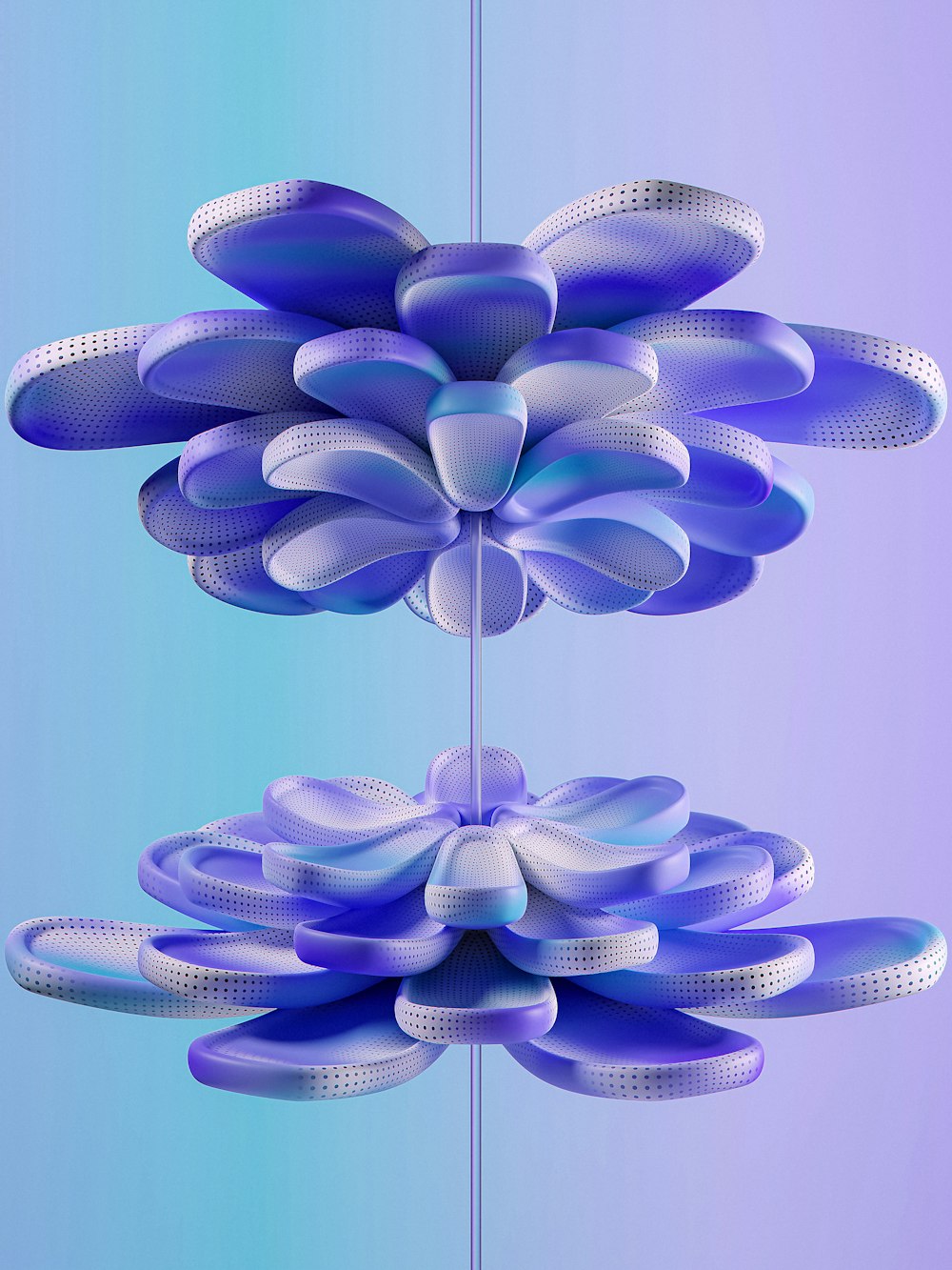 a blue and white flower hanging from a ceiling