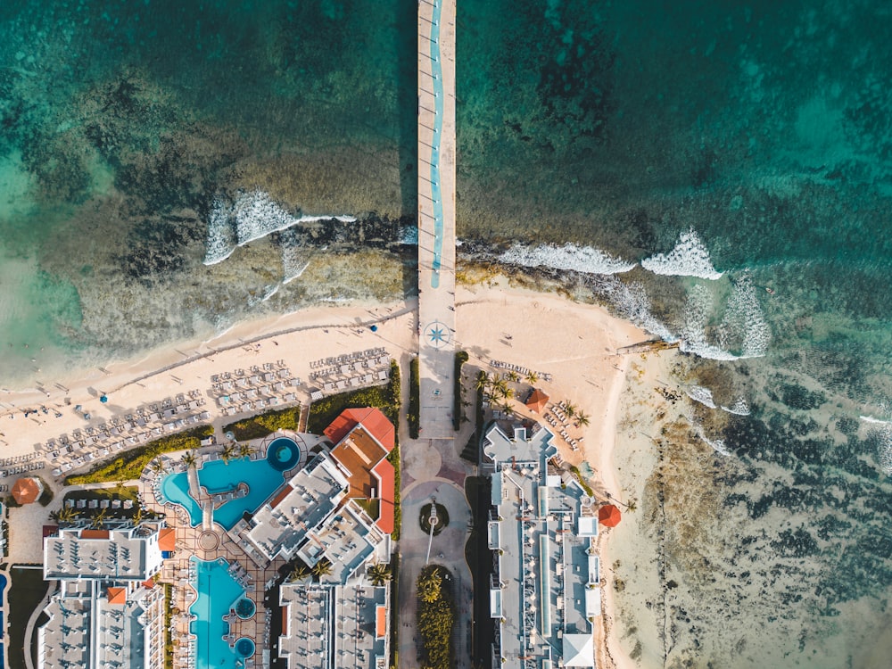 an aerial view of a beach and resort