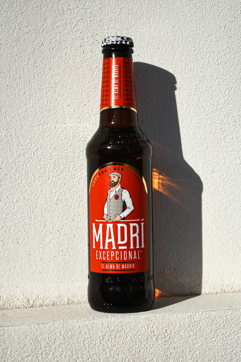 a bottle of beer sitting on top of a counter