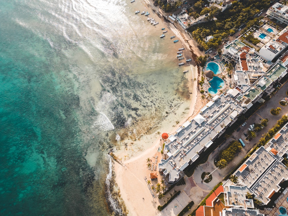 an aerial view of a beach and a city