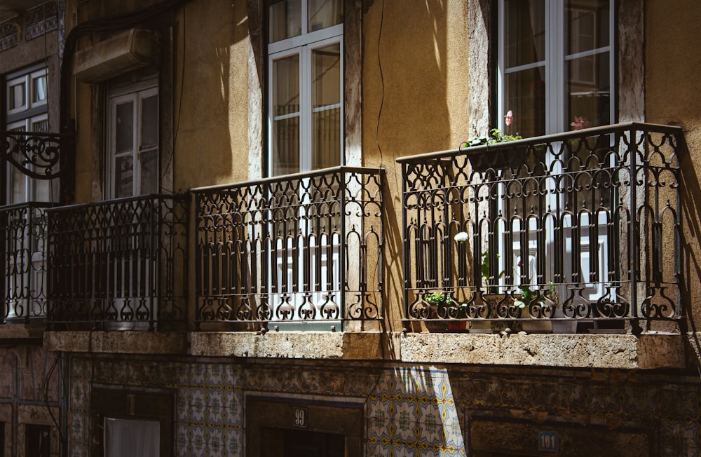 a balcony of a building with iron railings