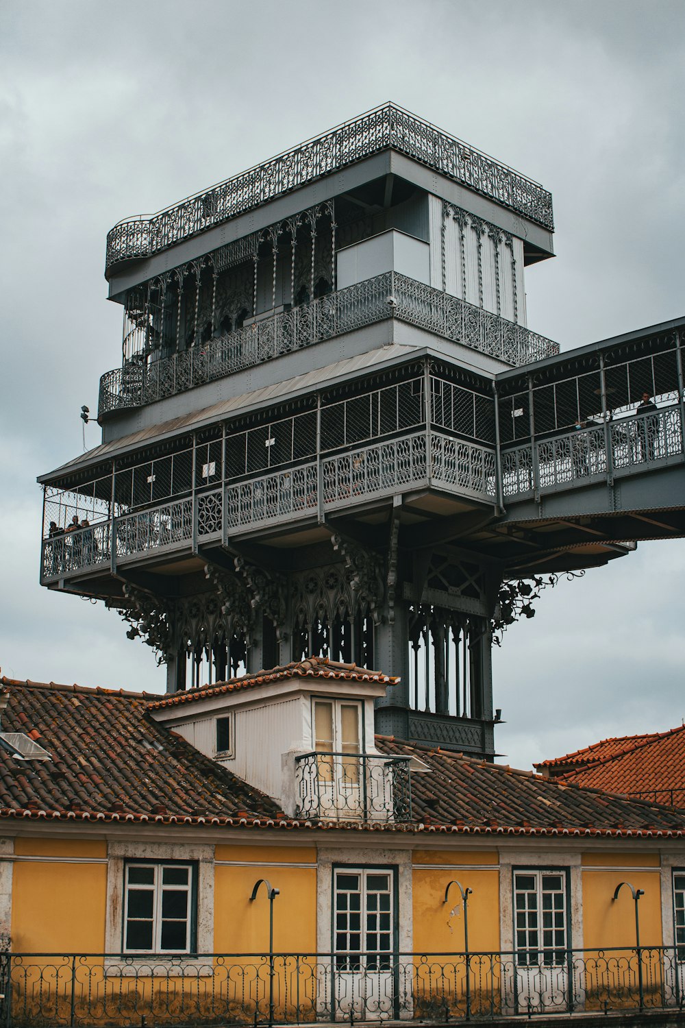 a tall building with a balcony and balcony balconies