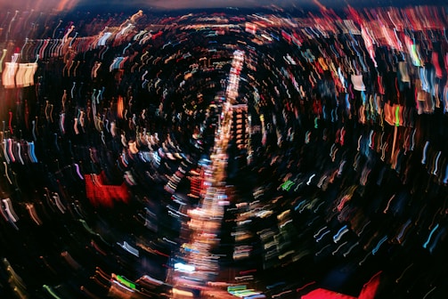 Close-up of frequency waves visualized as colorful patterns over a city map