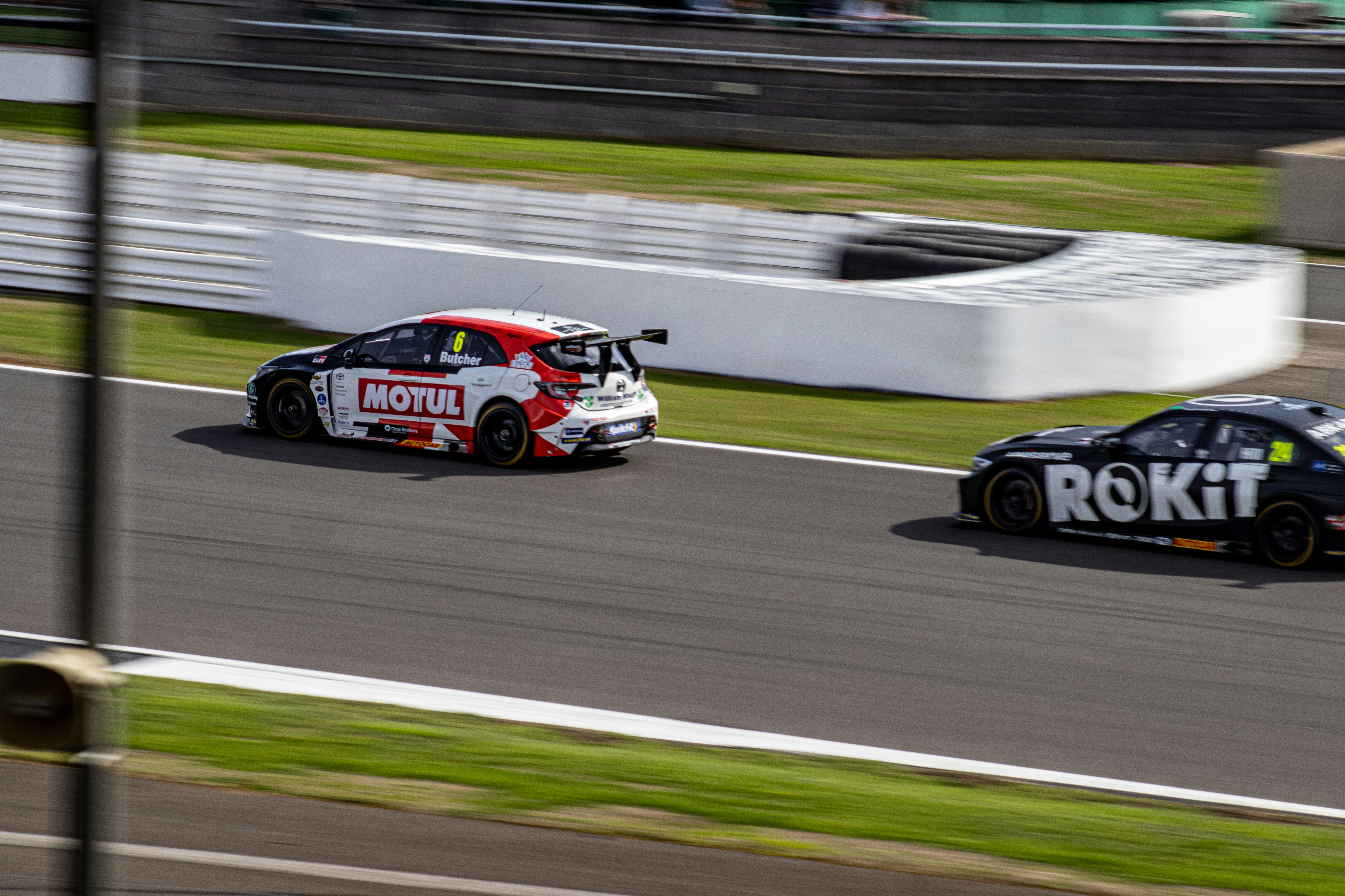 RC cars racing on track