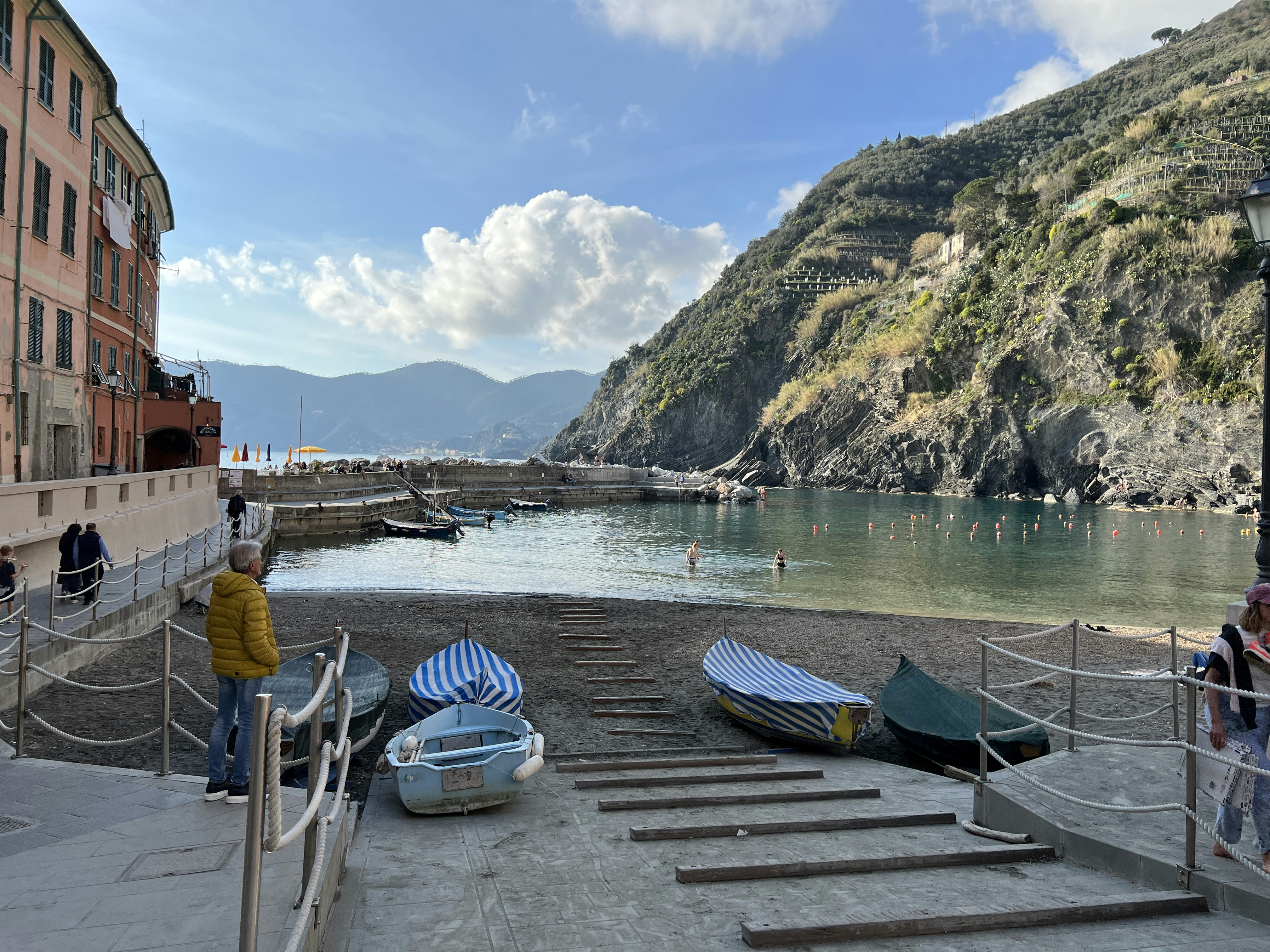 a couple of boats sitting on top of a beach