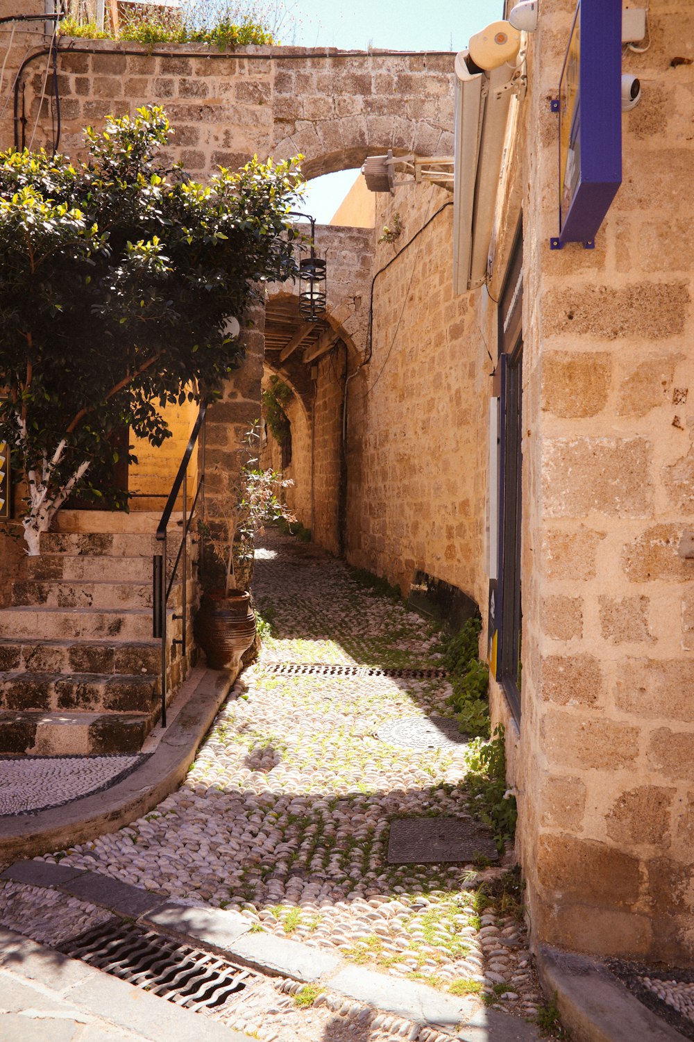 a cobblestone street in an old city