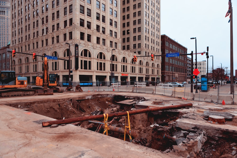 a large hole in the ground in a city