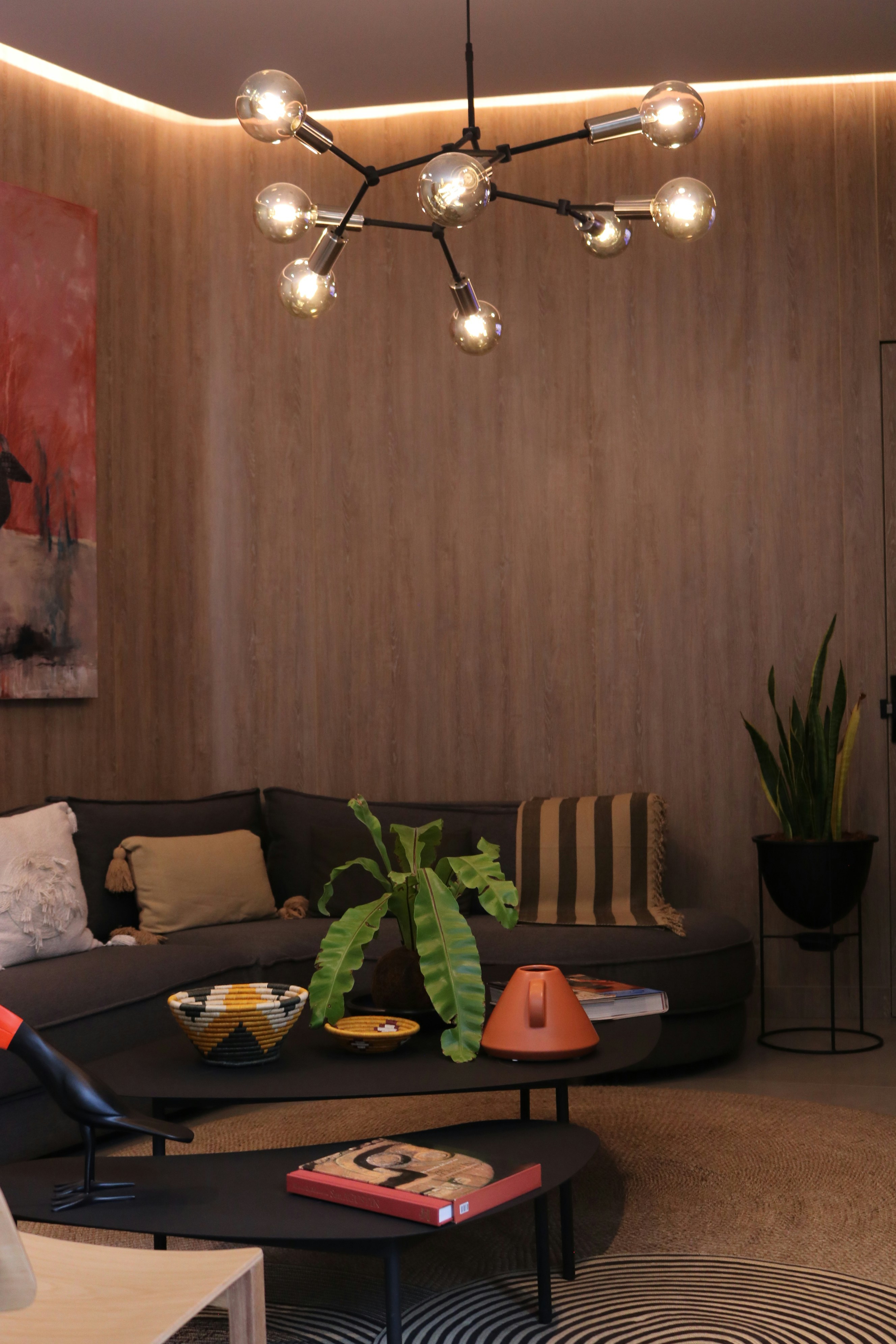 a living room with a couch and a table