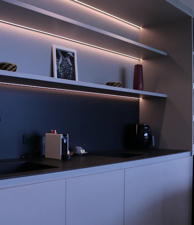 Custom modern kitchen cabinets in a bright, stylish Brazilian home setting.