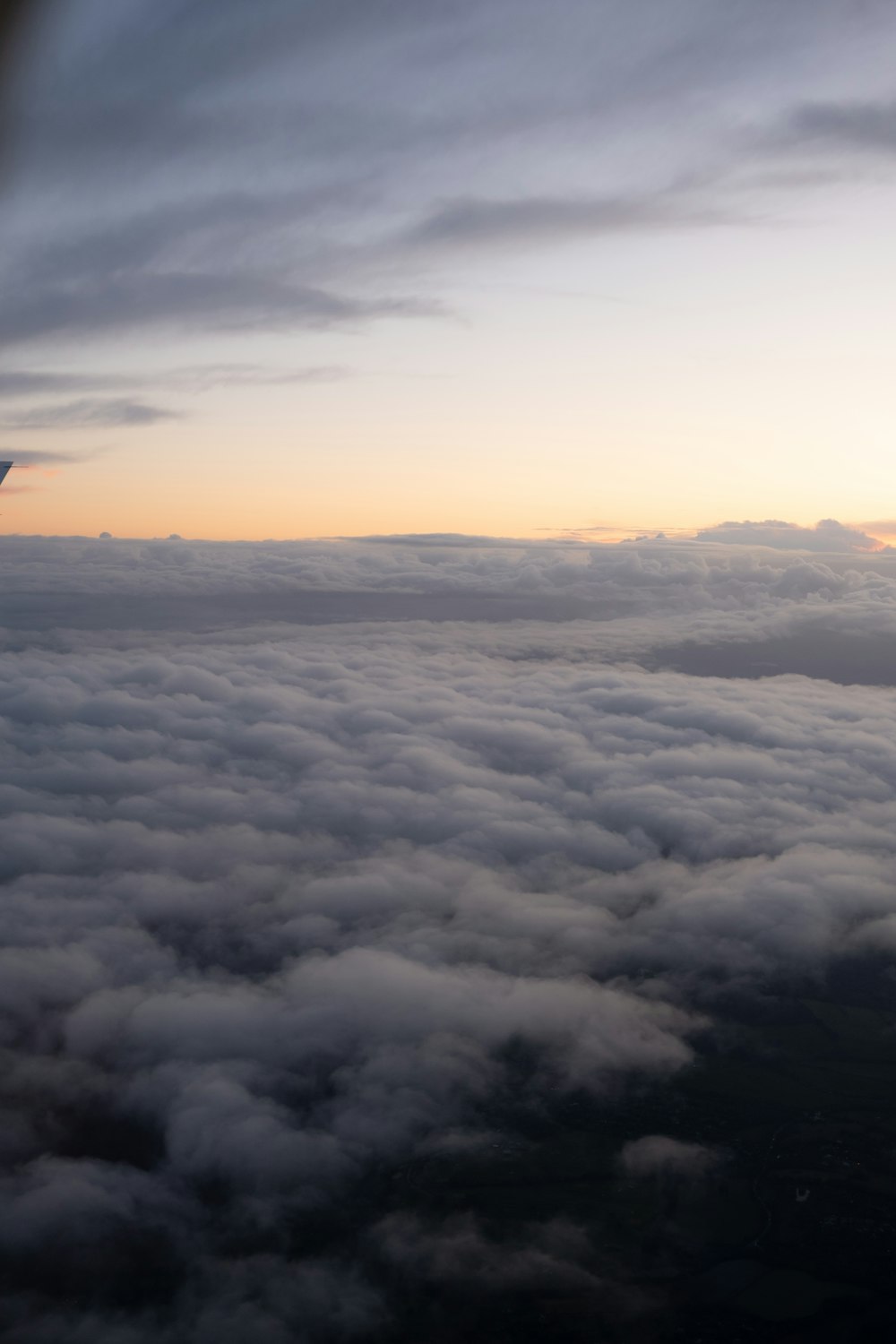 a view of the clouds from an airplane window