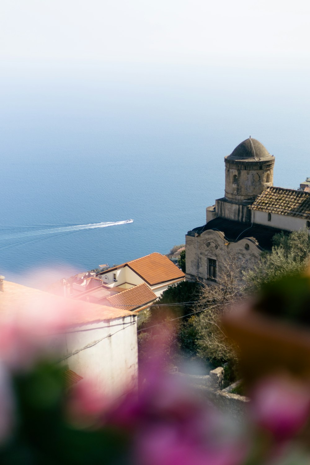 a view of the ocean from a hill top