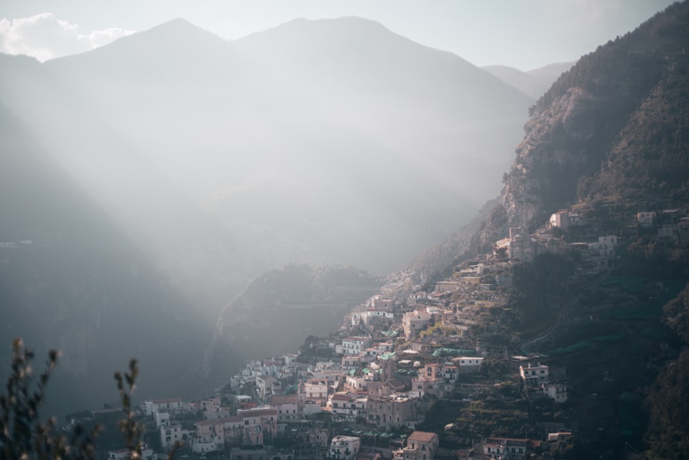 a view of a village in the mountains