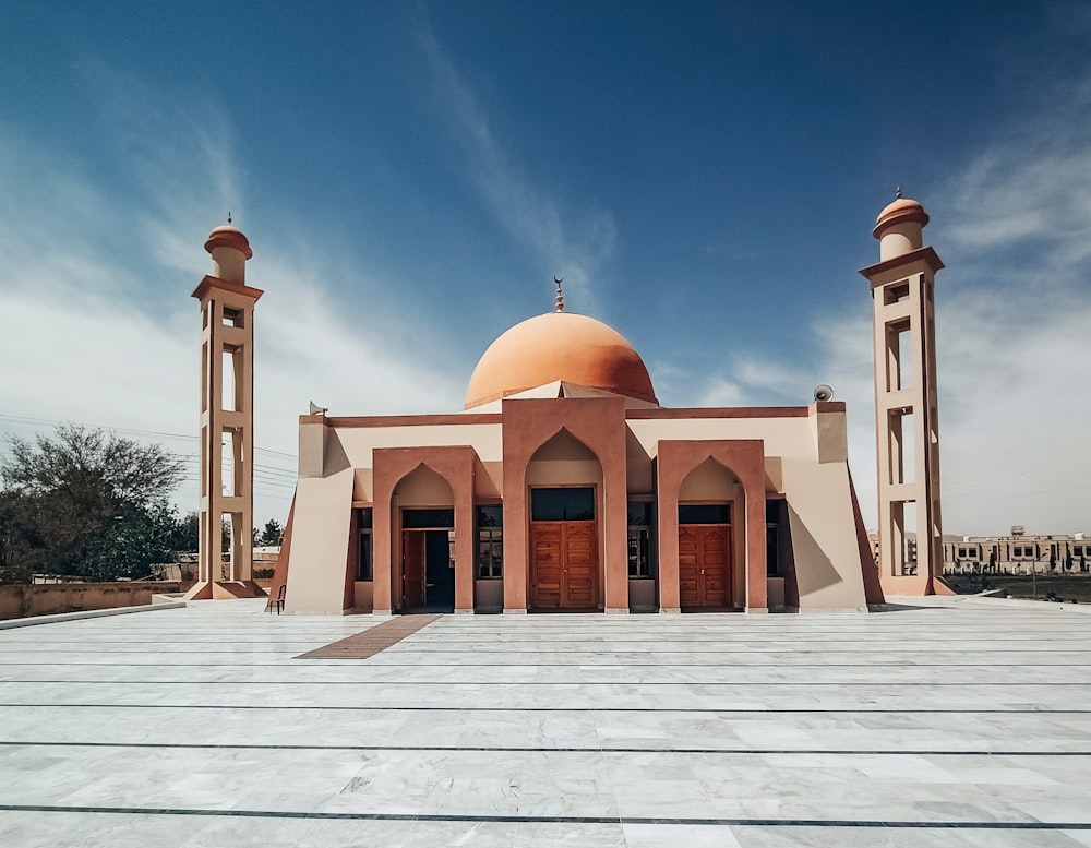 a large building with two towers and a dome