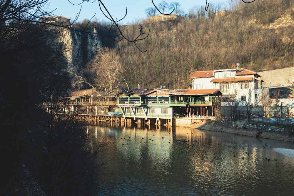 a body of water with a building on the side of it