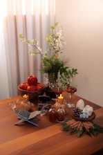 Close-up of elegant home essentials arranged neatly on a wooden table.