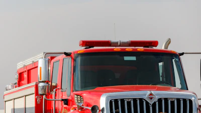 Modern firefighting truck and rescue ambulance ready for emergency response.