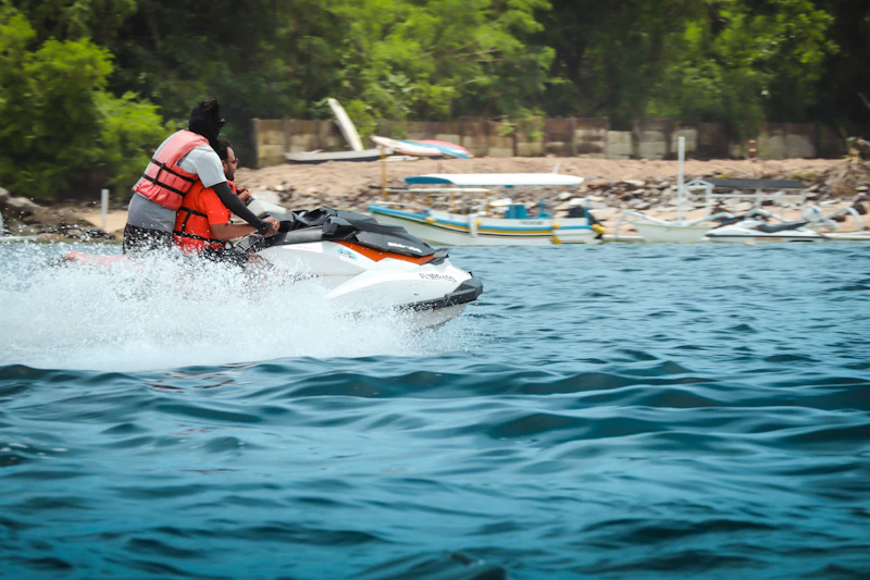 A rider wearing a life jacket on a jet ski in Bali