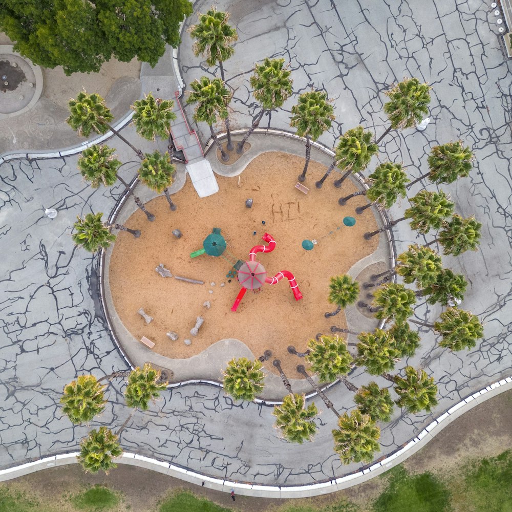 an aerial view of a park with a playground
