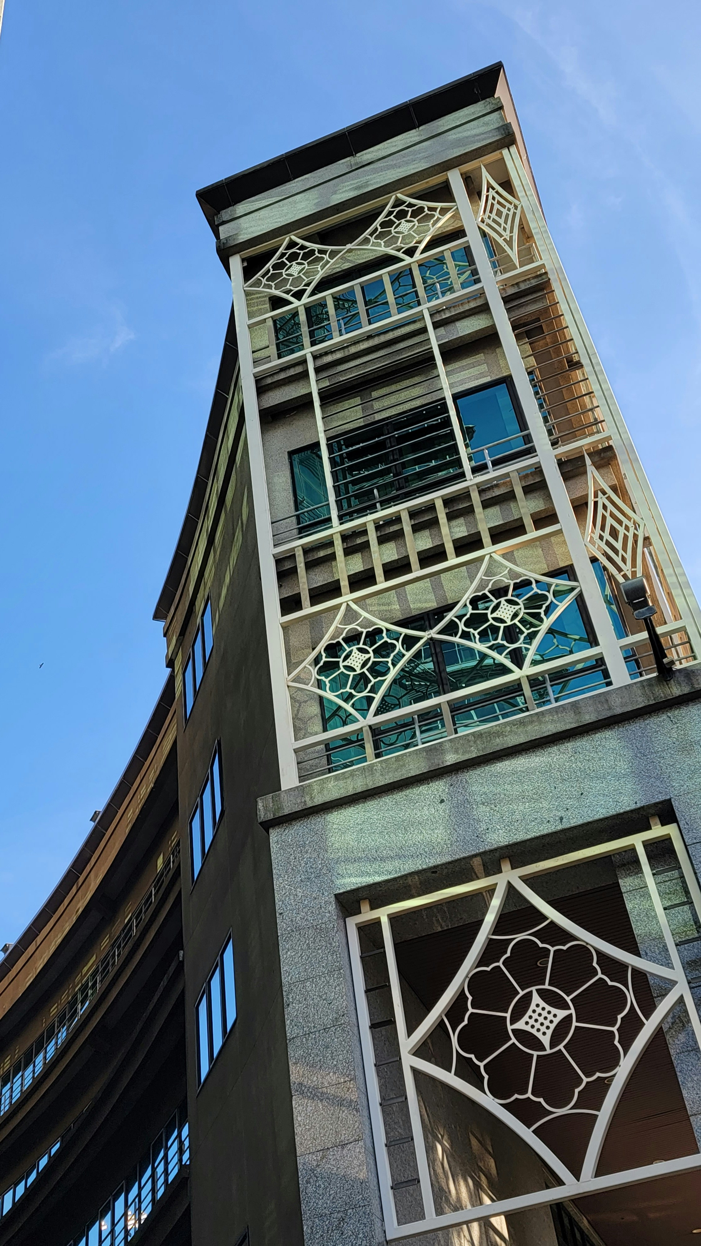 a tall building with a clock on the side of it