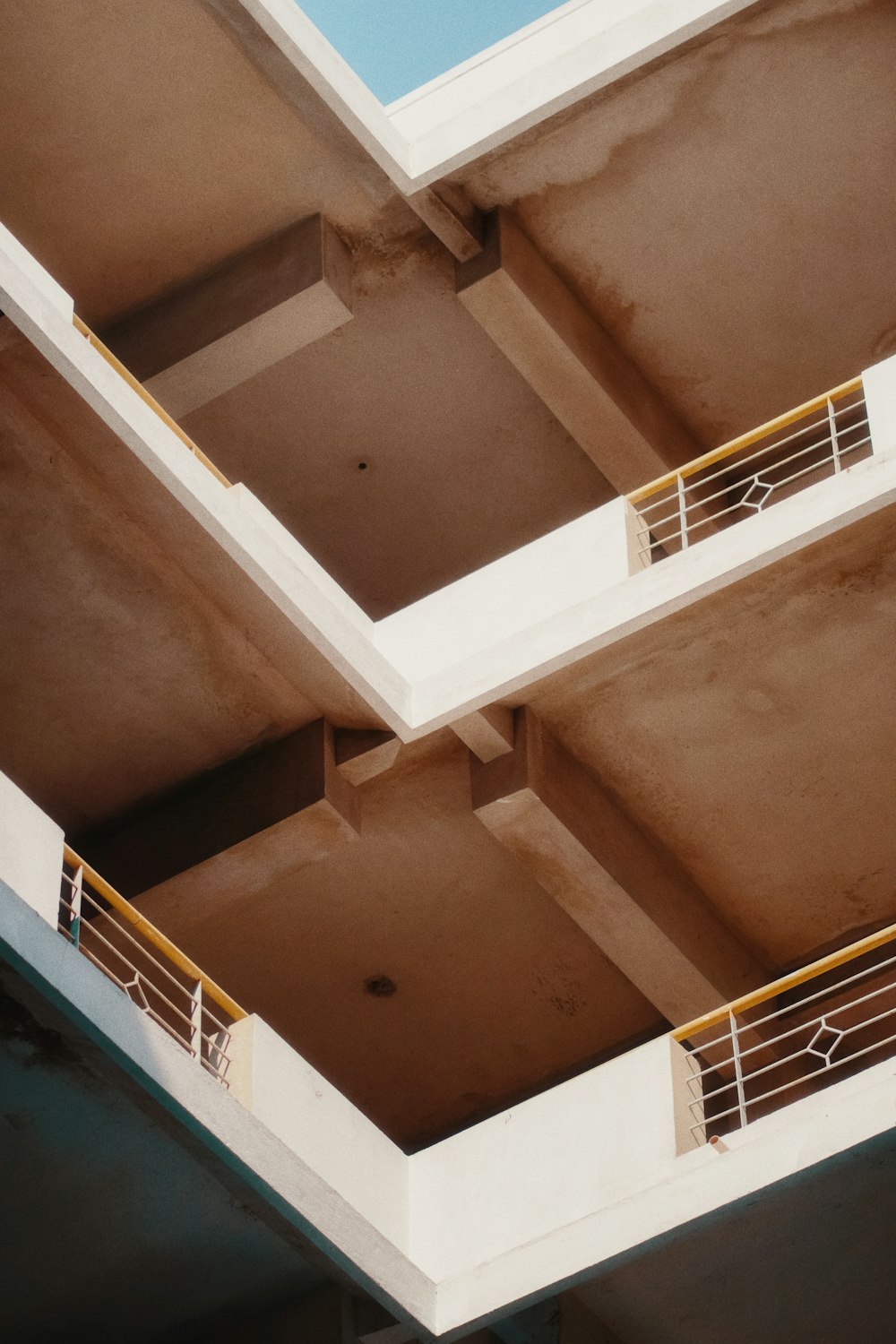 a building with two balconies and a balcony