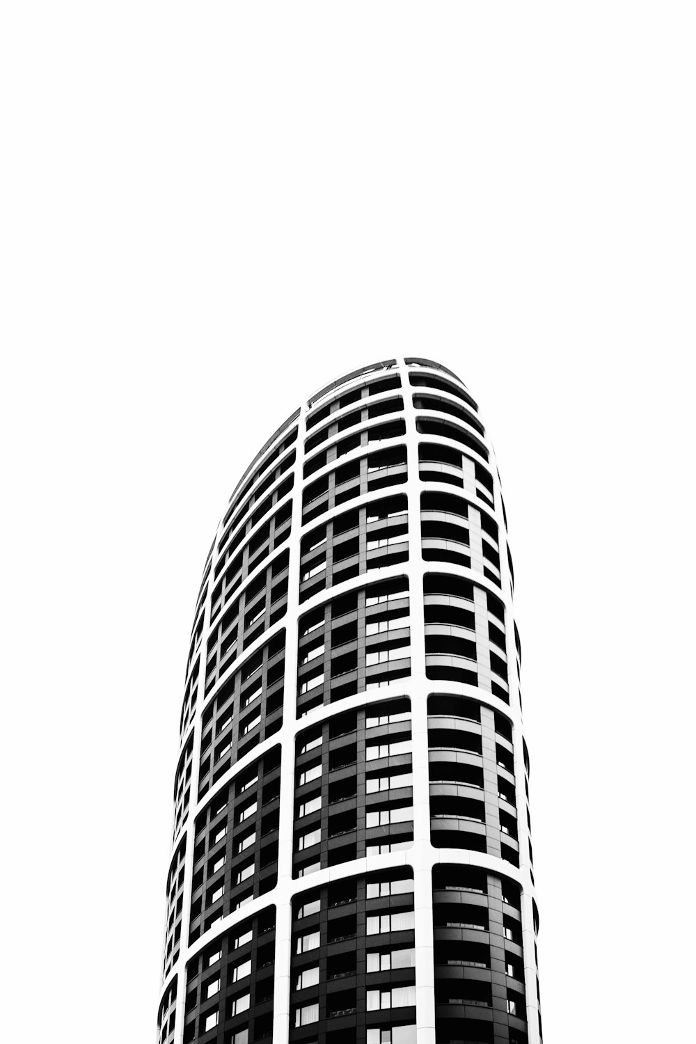 a black and white photo of a tall building