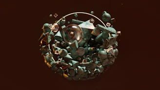 A collection of magnetic rings arranged artistically on a marble slab with gentle shadows.